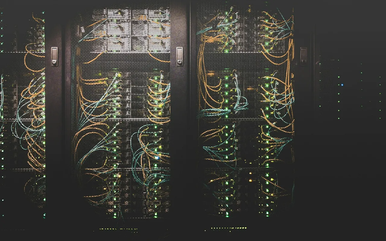 Server racks behind a well-kept website